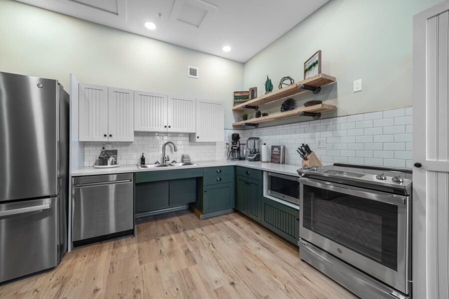 Duluth Rental Suite 102 - Full kitchen with custom cabinets and modern appliances