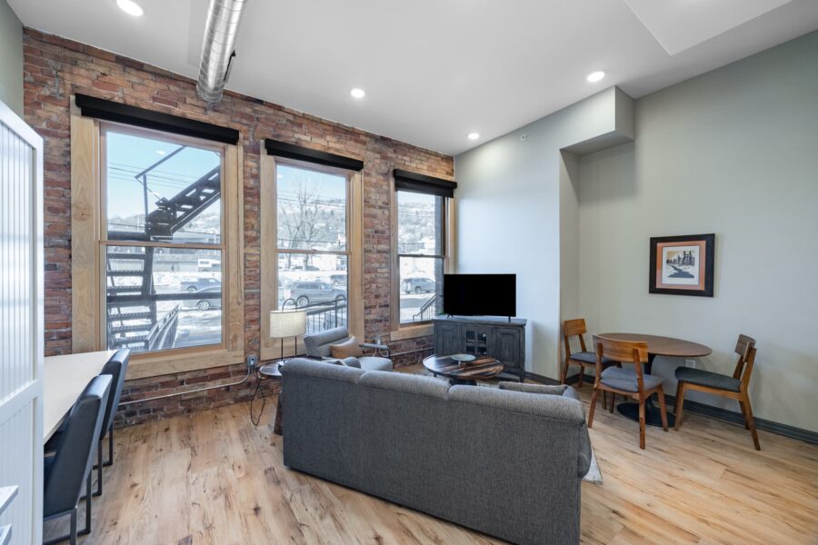 Duluth Rental Suite 102 - Living area with large windows and view