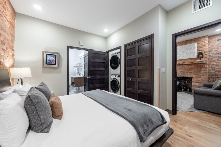 Duluth Rental Suite 201 - double bed with clothes closet and closet for laundry, on suite bathroom