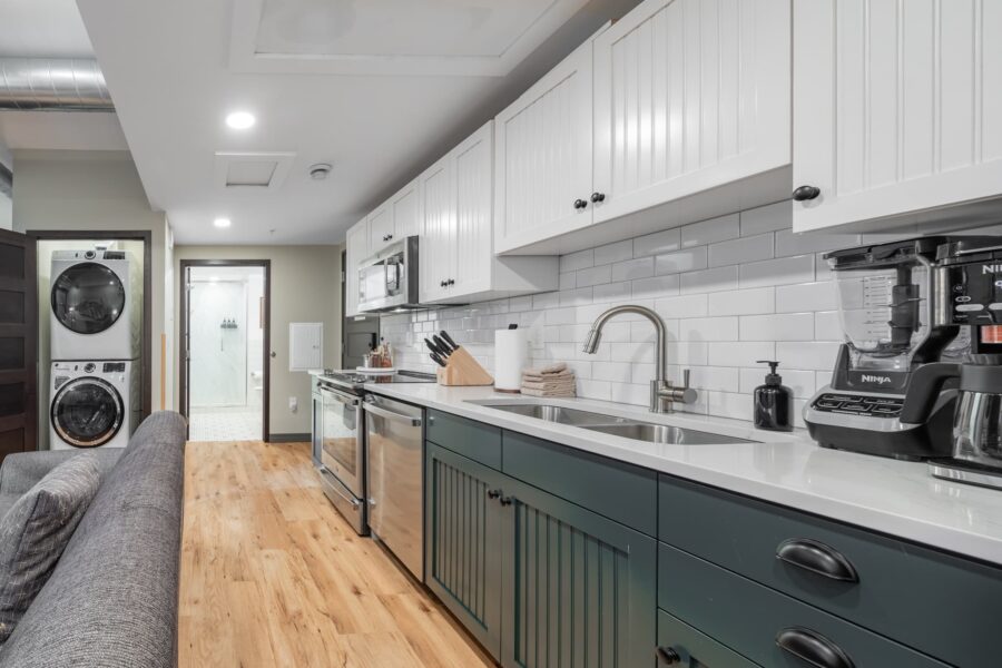 Duluth Rental Suite 202 - Full kitchen with cabinets and subway tile