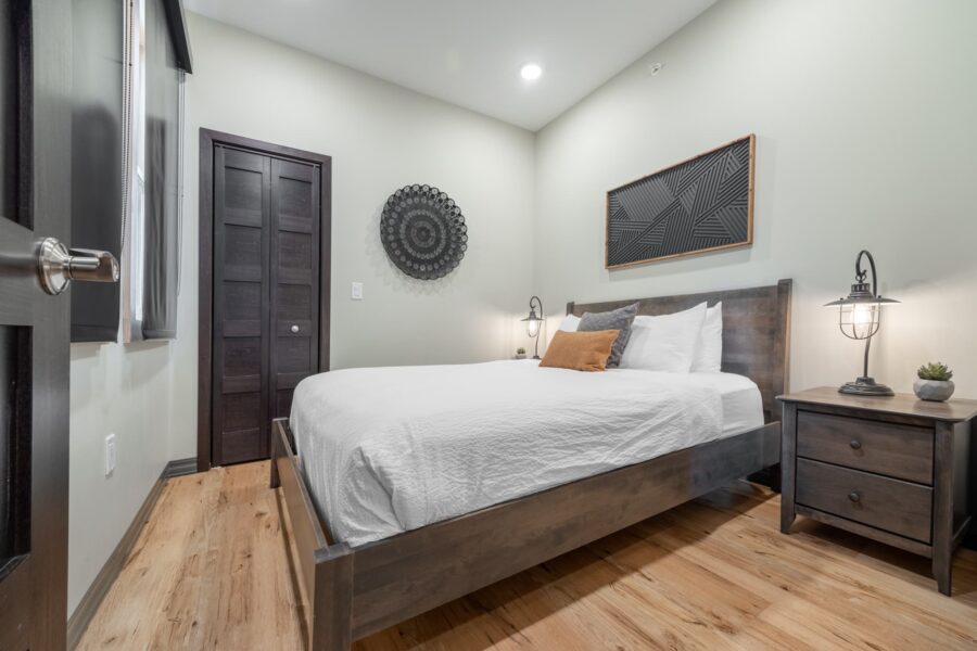Duluth Rental Suite 202 - Queen bedroom with nightstand/dresser