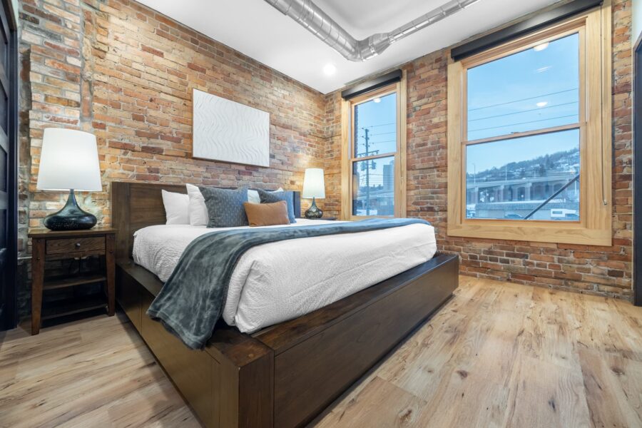 Duluth Rental Suite 203 - King size bed, large windows with view, exposed brick