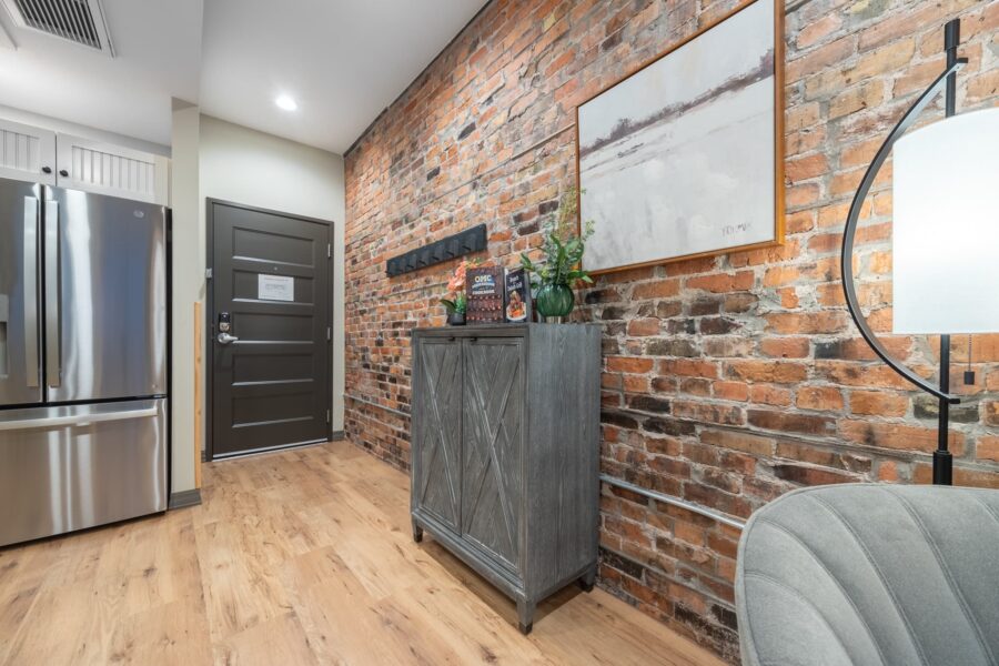 Duluth Rental Suite 301 - Entrance with exposed brick and hardwood floors