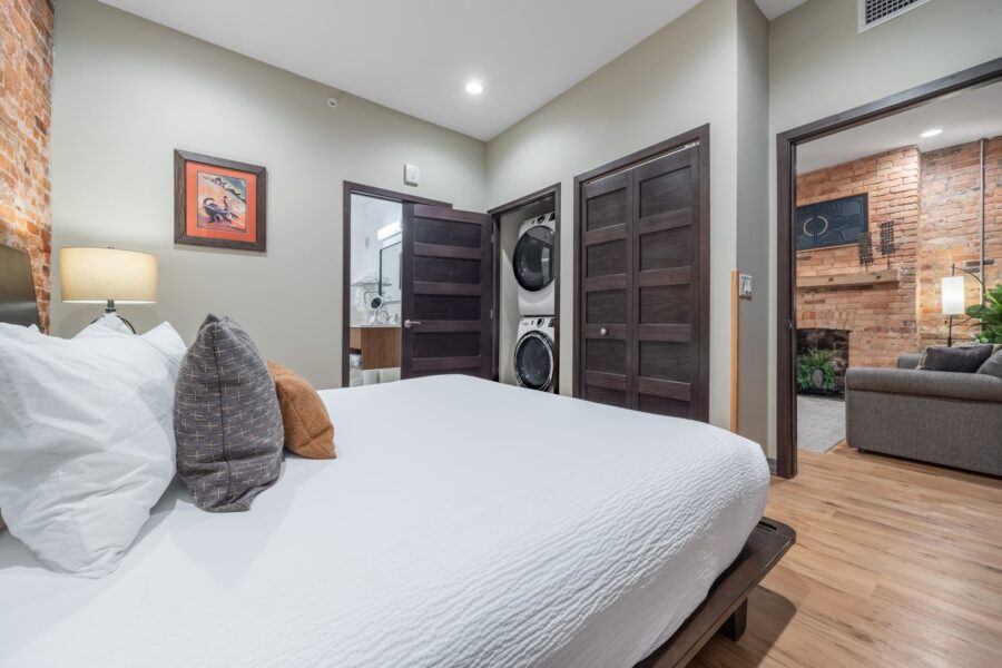 Duluth Rental Suite 301 - Bedroom with washer and dryer in closet