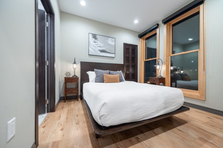 Duluth Rental Suite 303 - Queen bedroom with windows and view